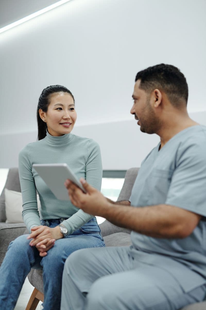 A patient and a clinician going through results together.